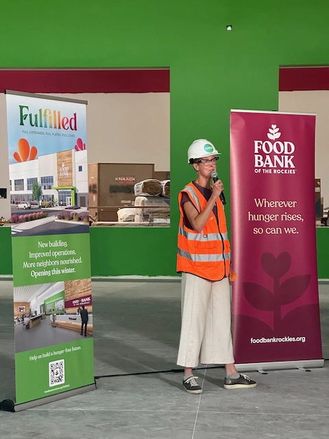 Food Bank of the Rockies President and CEO Erin Pulling addresses the media