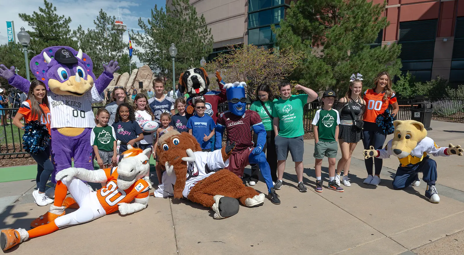 Kids pose with Colorado sports mascots at the Colorado Youth Sports Giving Day launch event