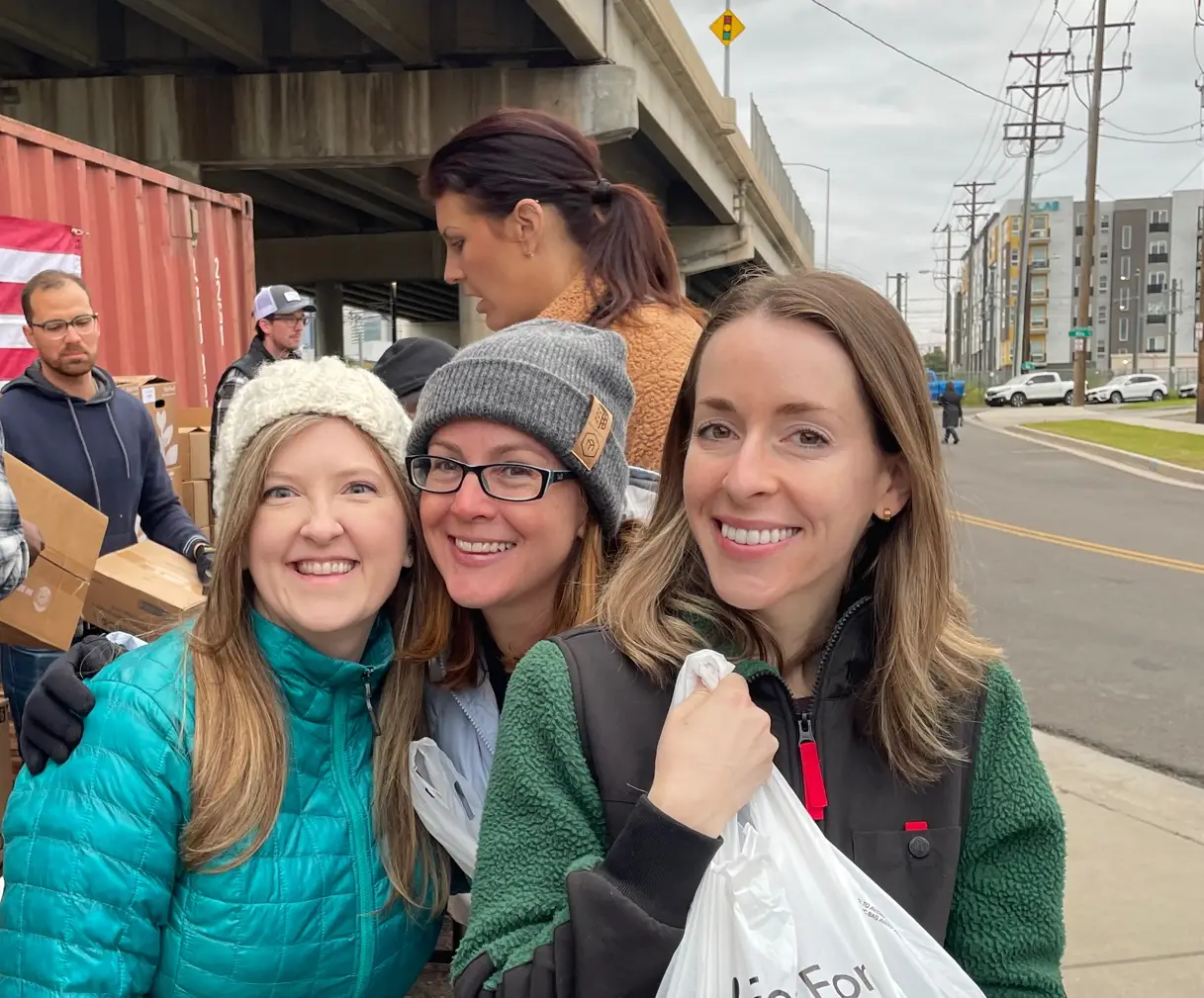 GFM|CenterTable team members volunteering at Food for Thought in Denver