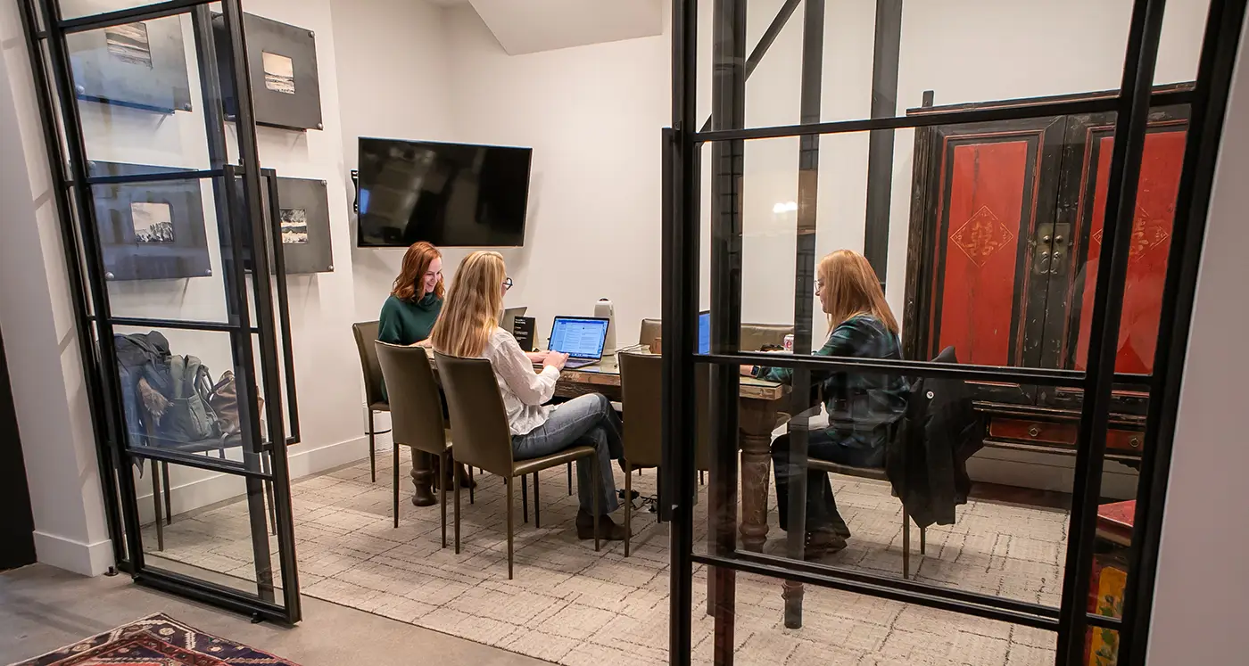 GFM|CenterTable team members in a meeting