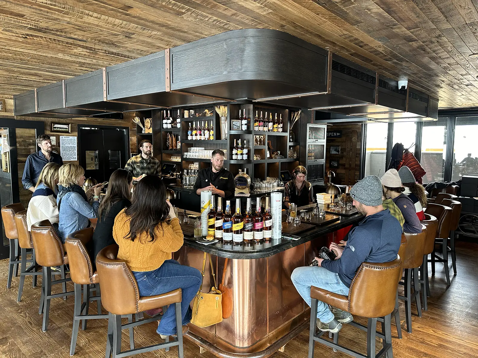 Influencers at an opening event for Stranahan's Aspen Tasting Lodge